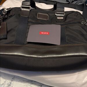 TUMI Black and Dark Brown Duffel Bag